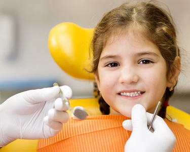 Girl in dental chair